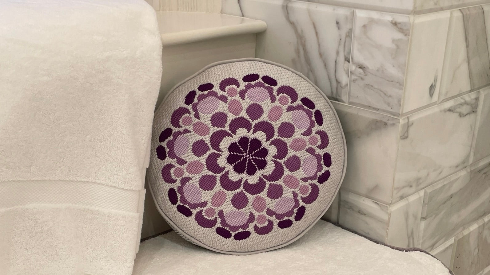 Bargello Needlepoint shop exclusive Mandala needlepoint canvas finished as a round pillow