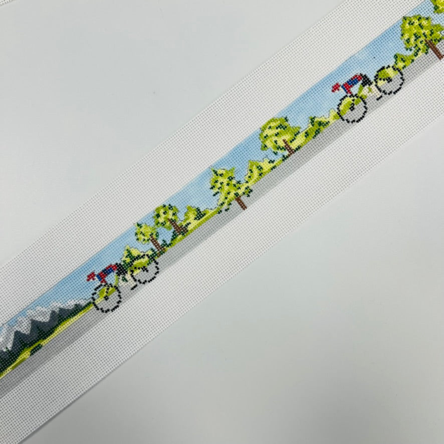 Bicycling Scene with Mountain Belt