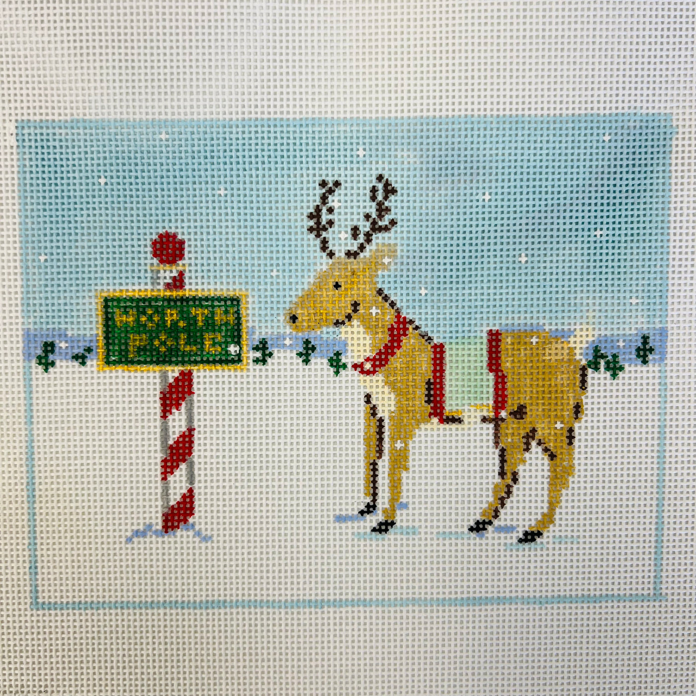 Reindeer Games Series Needlepoint Canvas - Reindeer and North Pole Sign with stitch guide